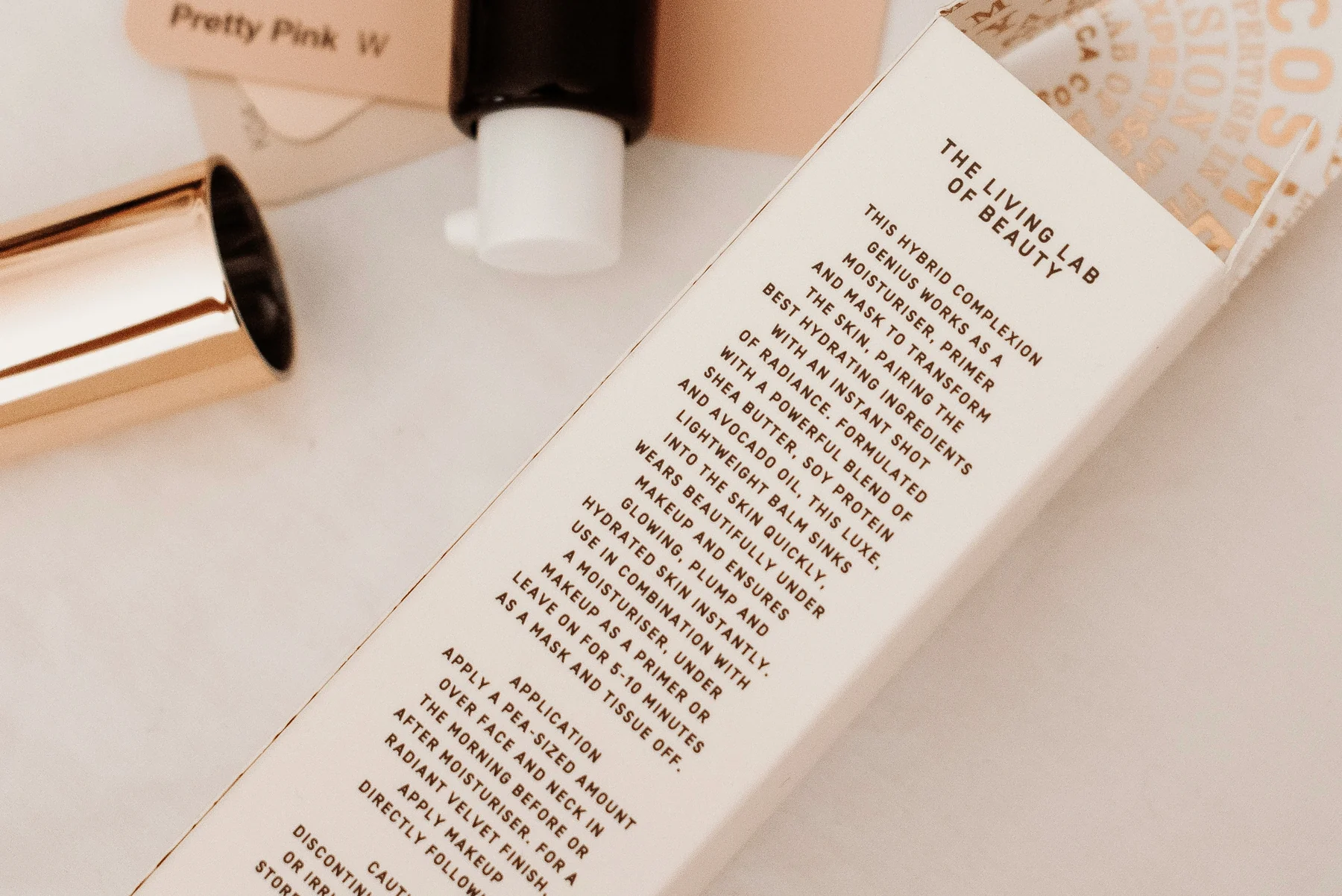 Original text-heavy source image for Beauty box packaging - dense product copy cleared from the side panel