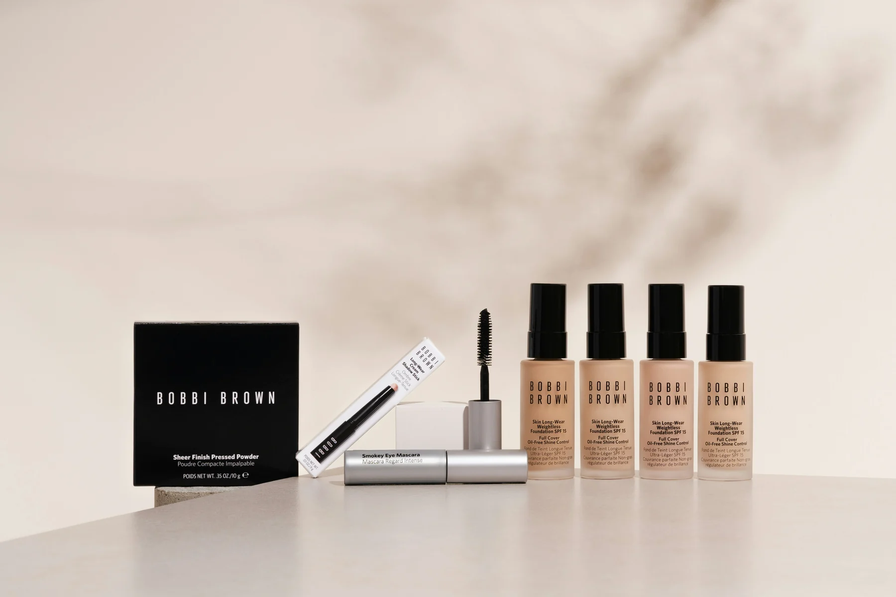 Original makeup product set with visible package and bottle text